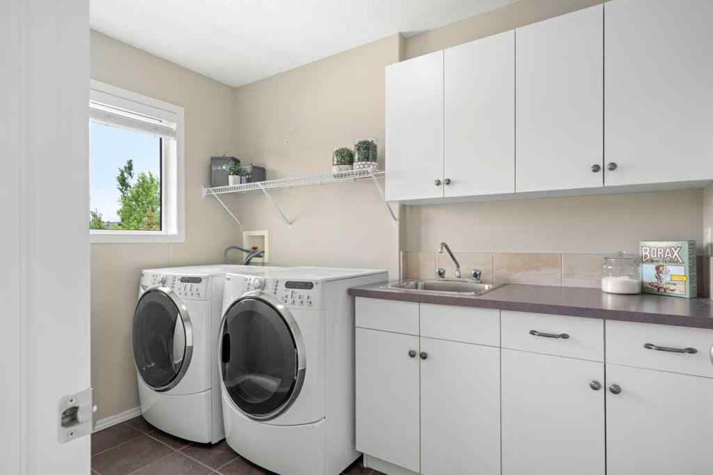 MLS® A2250587 - 15 Spring Willow Way SW in Springbank Hill Calgary, Residential