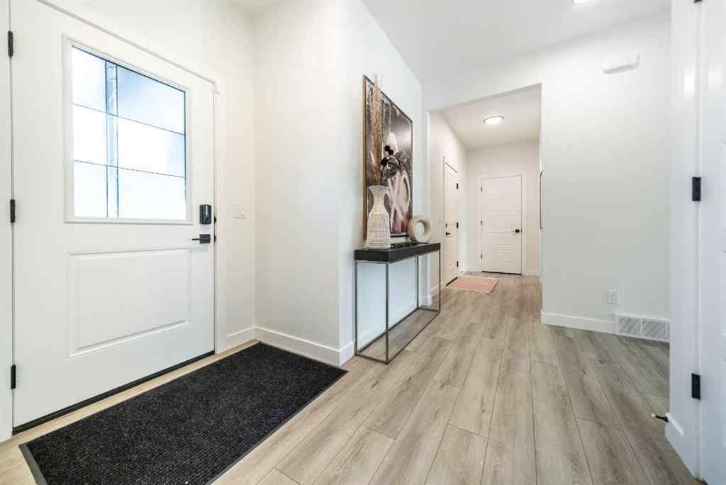 MLS® A2250620 - 390 Hotchkiss Manor SE in Hotchkiss Calgary, Residential