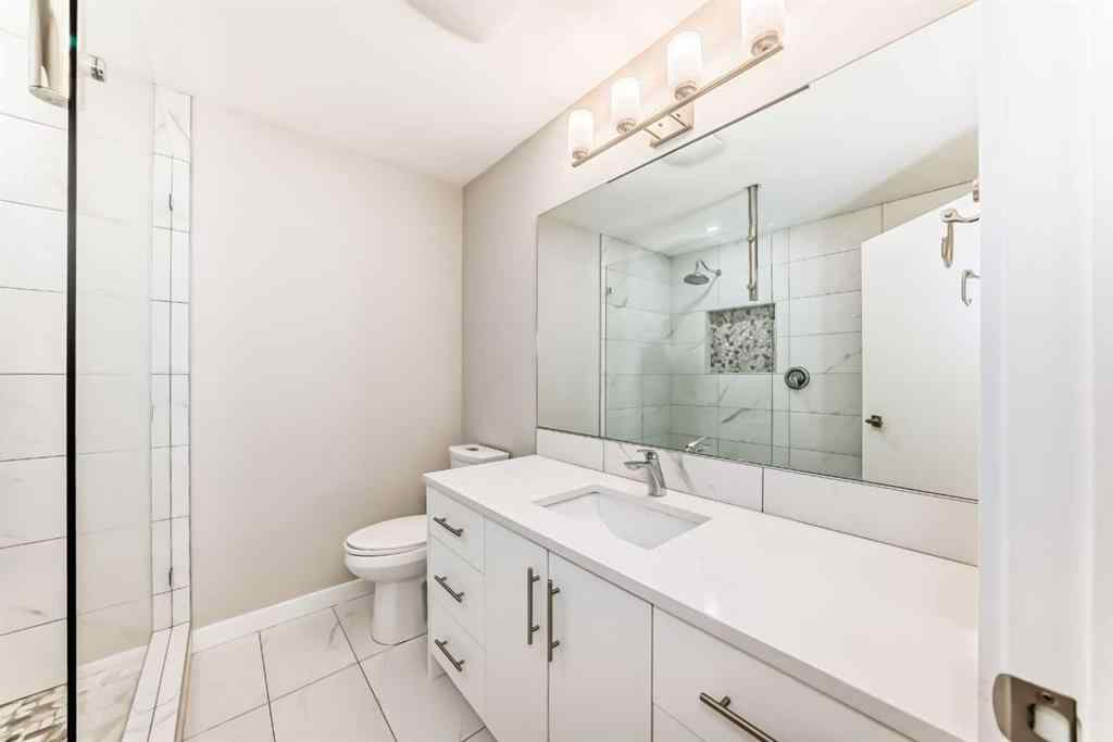 MLS® A2250629 - 51 Strathearn Crescent SW in Strathcona Park Calgary, Residential