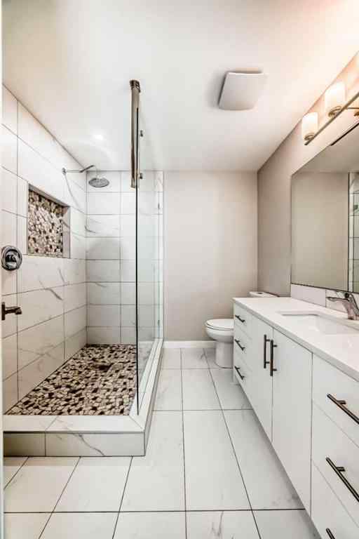 MLS® A2250629 - 51 Strathearn Crescent SW in Strathcona Park Calgary, Residential