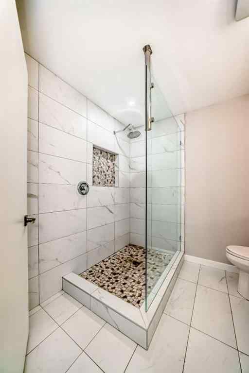 MLS® A2250629 - 51 Strathearn Crescent SW in Strathcona Park Calgary, Residential