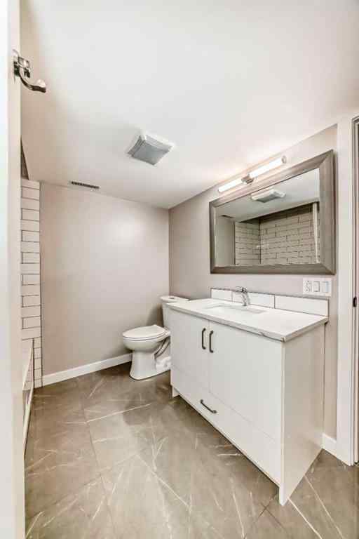 MLS® A2250629 - 51 Strathearn Crescent SW in Strathcona Park Calgary, Residential