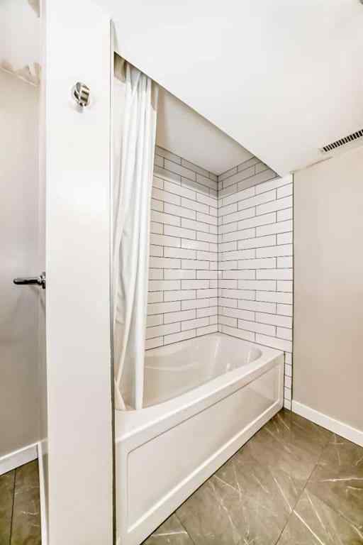 MLS® A2250629 - 51 Strathearn Crescent SW in Strathcona Park Calgary, Residential