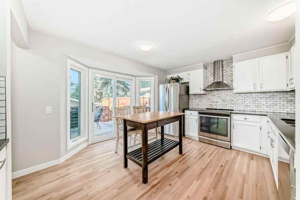 MLS® A2250629 - 51 Strathearn Crescent SW in Strathcona Park Calgary, Residential