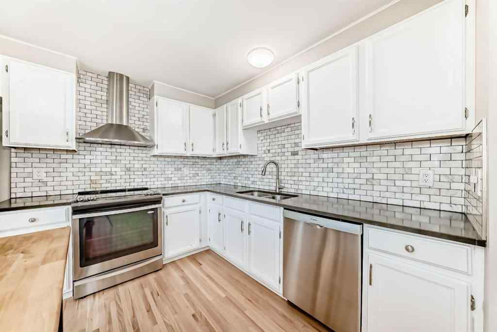 MLS® A2250629 - 51 Strathearn Crescent SW in Strathcona Park Calgary, Residential