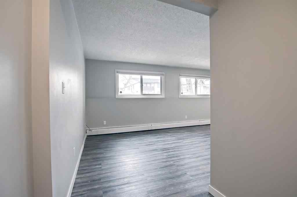 MLS® A2250655 - Unit #101 4512 75 Street NW in Bowness Calgary, Residential