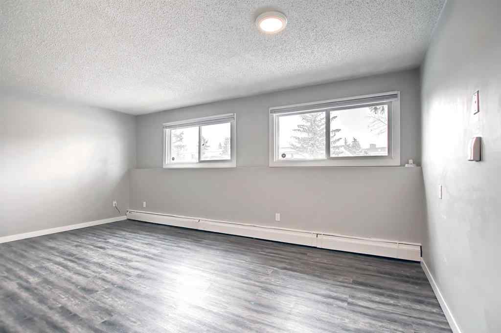 MLS® A2250655 - Unit #101 4512 75 Street NW in Bowness Calgary, Residential