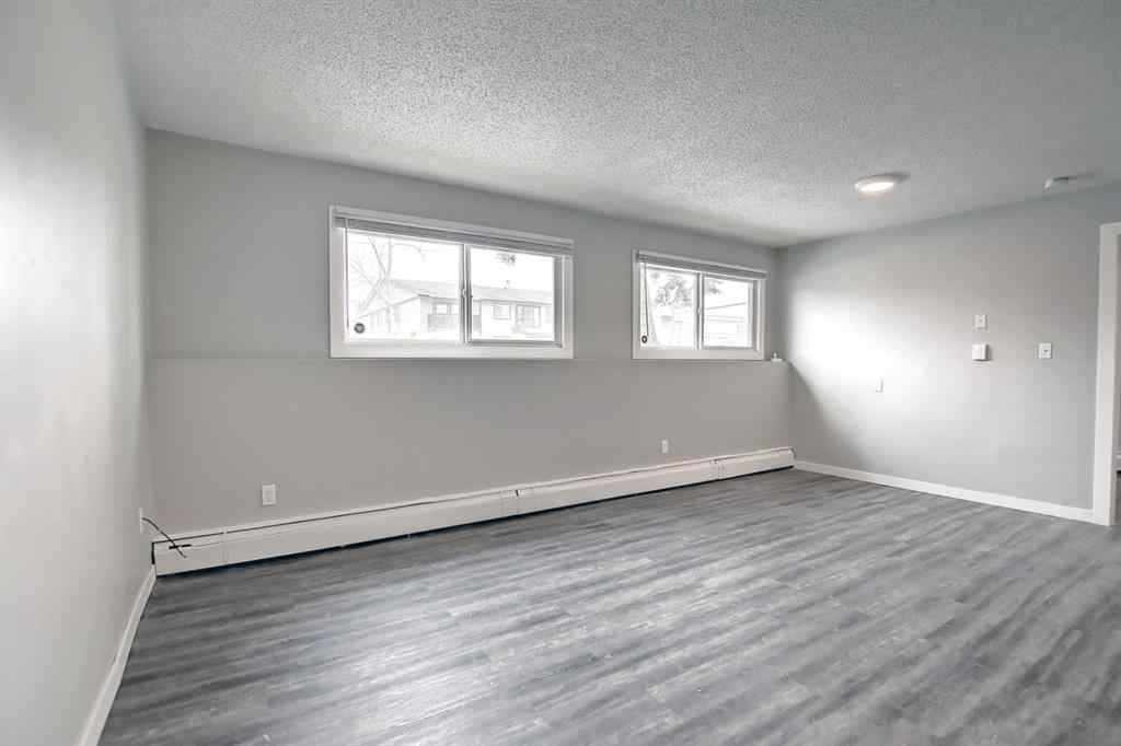 MLS® A2250655 - Unit #101 4512 75 Street NW in Bowness Calgary, Residential