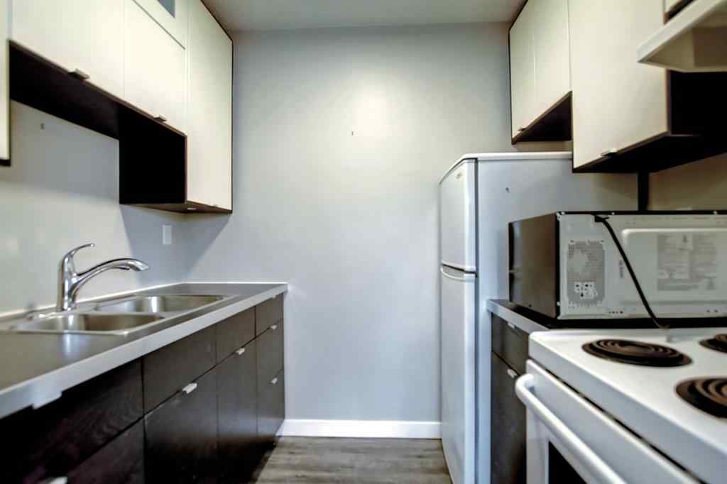MLS® A2250655 - Unit #101 4512 75 Street NW in Bowness Calgary, Residential