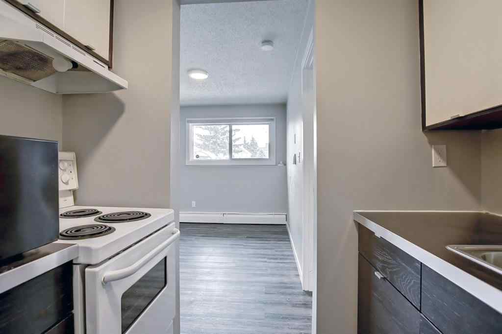 MLS® A2250655 - Unit #101 4512 75 Street NW in Bowness Calgary, Residential