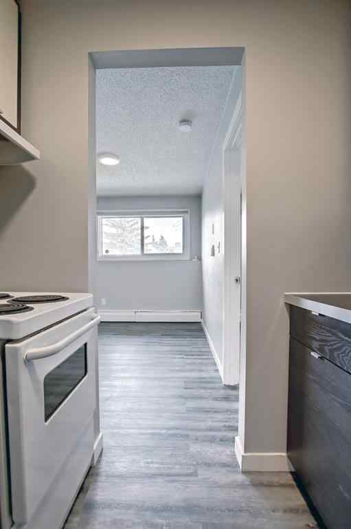 MLS® A2250655 - Unit #101 4512 75 Street NW in Bowness Calgary, Residential