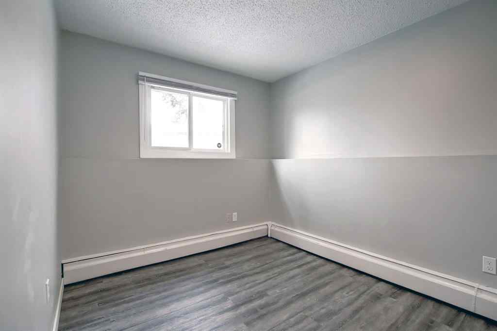 MLS® A2250655 - Unit #101 4512 75 Street NW in Bowness Calgary, Residential