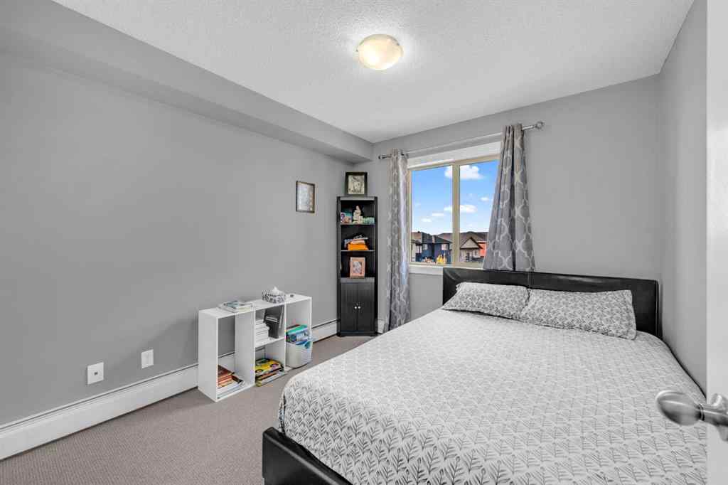 MLS® A2250660 - Unit #319 5 Saddlestone Way NE in Saddle Ridge Calgary, Residential