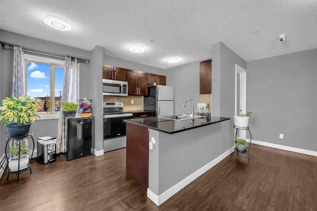 MLS® A2250660 - Unit #319 5 Saddlestone Way NE in Saddle Ridge Calgary, Residential