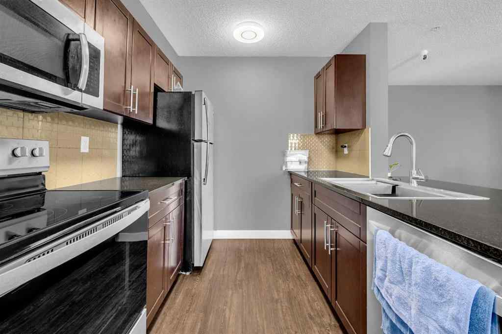 MLS® A2250660 - Unit #319 5 Saddlestone Way NE in Saddle Ridge Calgary, Residential