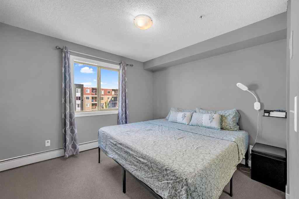 MLS® A2250660 - Unit #319 5 Saddlestone Way NE in Saddle Ridge Calgary, Residential