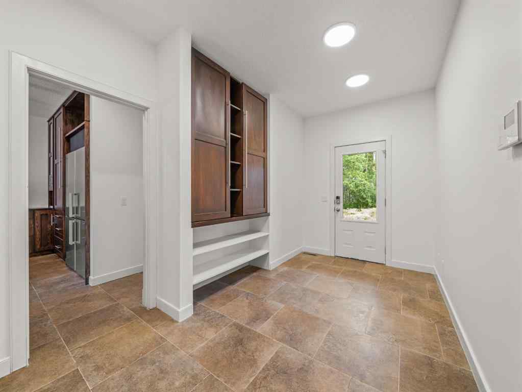 MLS® A2250704 - Unit #200 298075 218 Street W in NONE Rural Foothills County, Residential