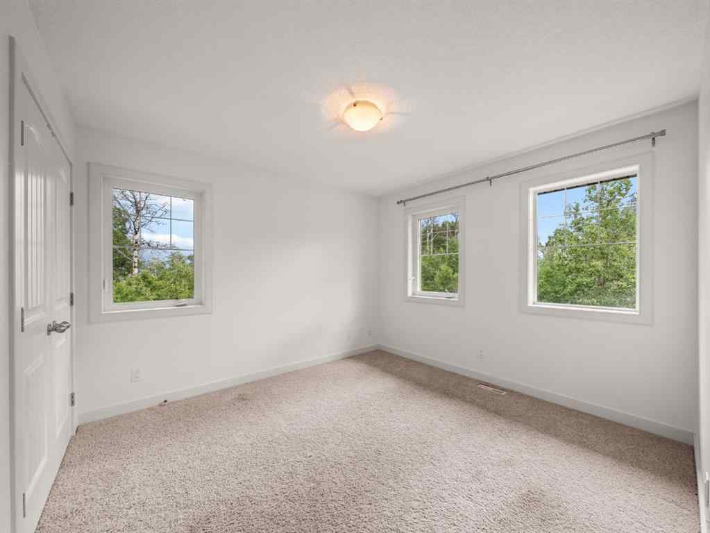 MLS® A2250704 - Unit #200 298075 218 Street W in NONE Rural Foothills County, Residential