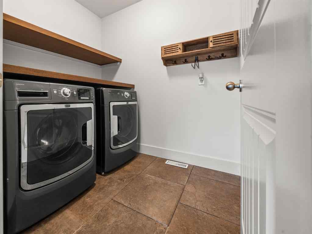 MLS® A2250704 - Unit #200 298075 218 Street W in NONE Rural Foothills County, Residential