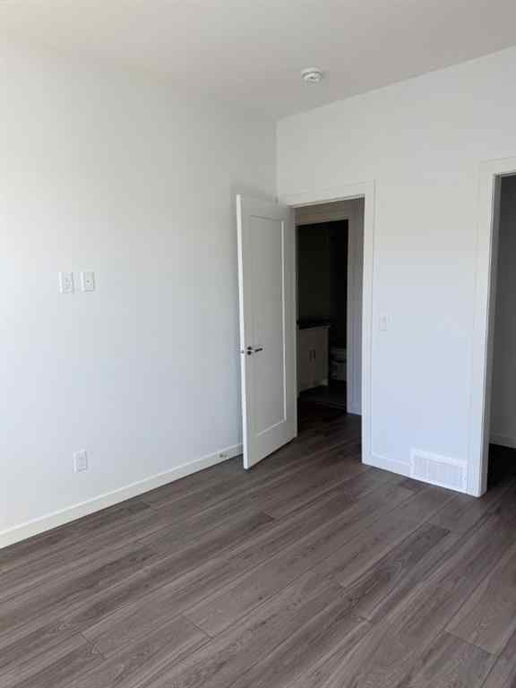 MLS® A2250709 - Unit #104 1453 Na'a Drive SW in Medicine Hill Calgary, Residential