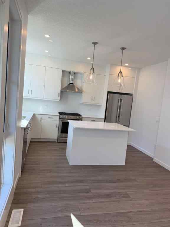 MLS® A2250709 - Unit #104 1453 Na'a Drive SW in Medicine Hill Calgary, Residential