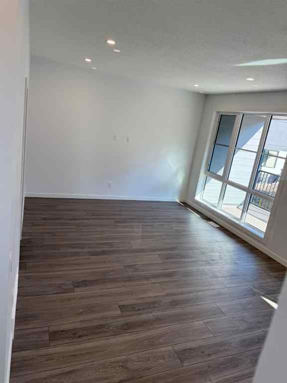 MLS® A2250709 - Unit #104 1453 Na'a Drive SW in Medicine Hill Calgary, Residential