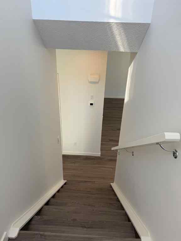 MLS® A2250709 - Unit #104 1453 Na'a Drive SW in Medicine Hill Calgary, Residential