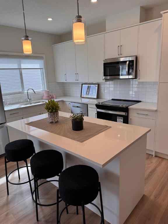 MLS® A2250769 - 4 Wolf Hollow Road SE in Wolf Willow Calgary, Residential