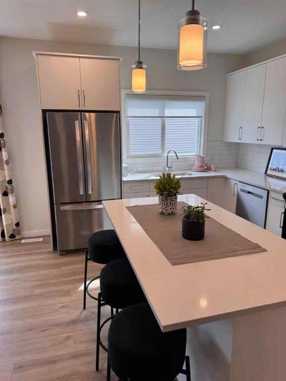 MLS® A2250769 - 4 Wolf Hollow Road SE in Wolf Willow Calgary, Residential