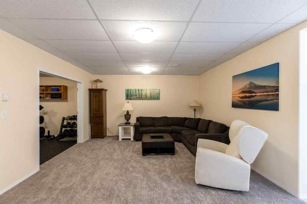 MLS® A2250770 - 6305 58 Avenue  in Hazelwood Estates Innisfail, Residential