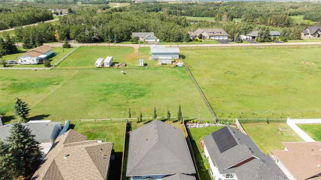 MLS® A2250770 - 6305 58 Avenue  in Hazelwood Estates Innisfail, Residential