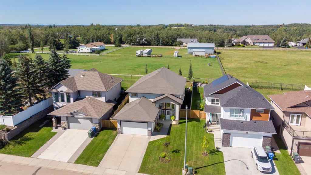 MLS® A2250770 - 6305 58 Avenue  in Hazelwood Estates Innisfail, Residential