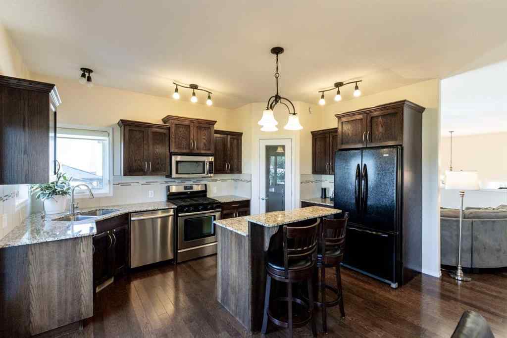 MLS® A2250770 - 6305 58 Avenue  in Hazelwood Estates Innisfail, Residential
