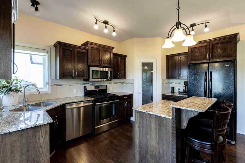 MLS® A2250770 - 6305 58 Avenue  in Hazelwood Estates Innisfail, Residential