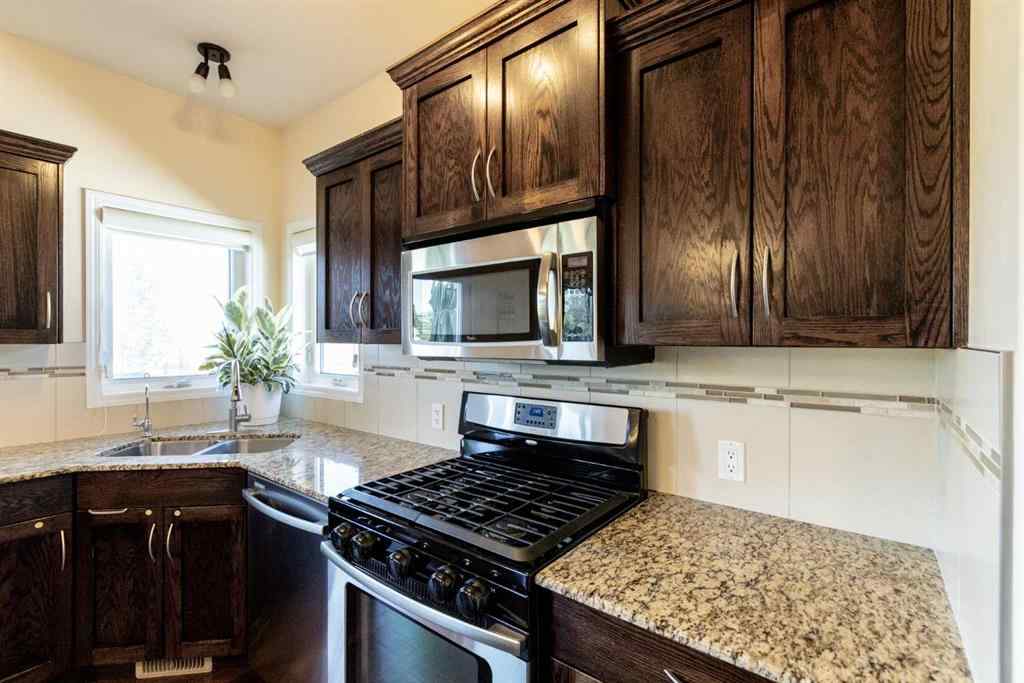 MLS® A2250770 - 6305 58 Avenue  in Hazelwood Estates Innisfail, Residential