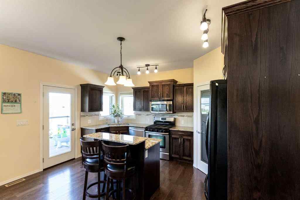 MLS® A2250770 - 6305 58 Avenue  in Hazelwood Estates Innisfail, Residential