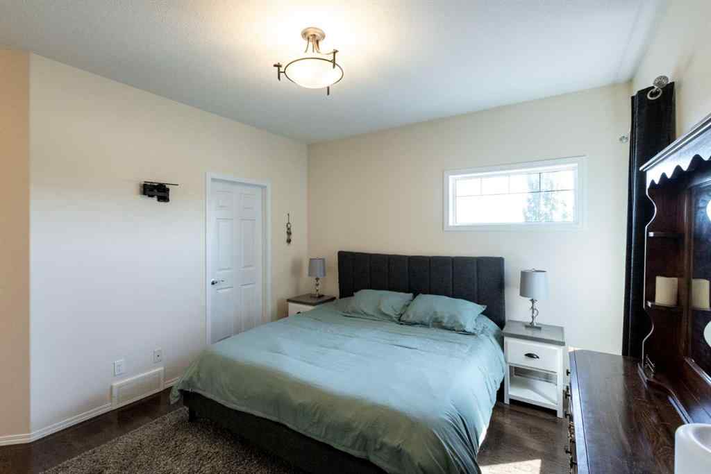 MLS® A2250770 - 6305 58 Avenue  in Hazelwood Estates Innisfail, Residential