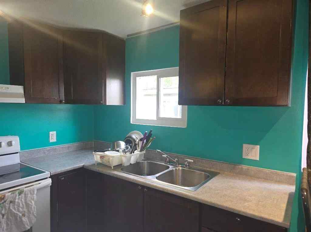 MLS® A2250771 - Unit #80 5344 76 Street  in Northwood Estates Red Deer, Mobile