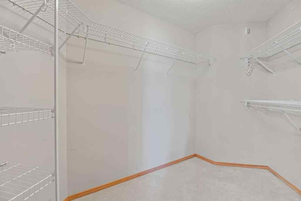 MLS® A2250792 - Unit #207 15 Everstone Drive SW in Evergreen Calgary, Residential