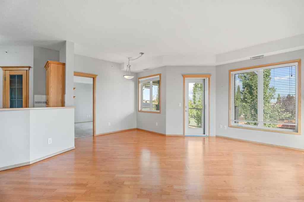 MLS® A2250792 - Unit #207 15 Everstone Drive SW in Evergreen Calgary, Residential