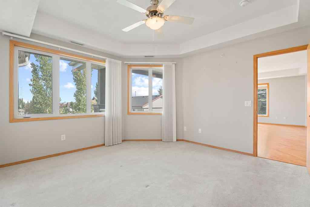 MLS® A2250792 - Unit #207 15 Everstone Drive SW in Evergreen Calgary, Residential