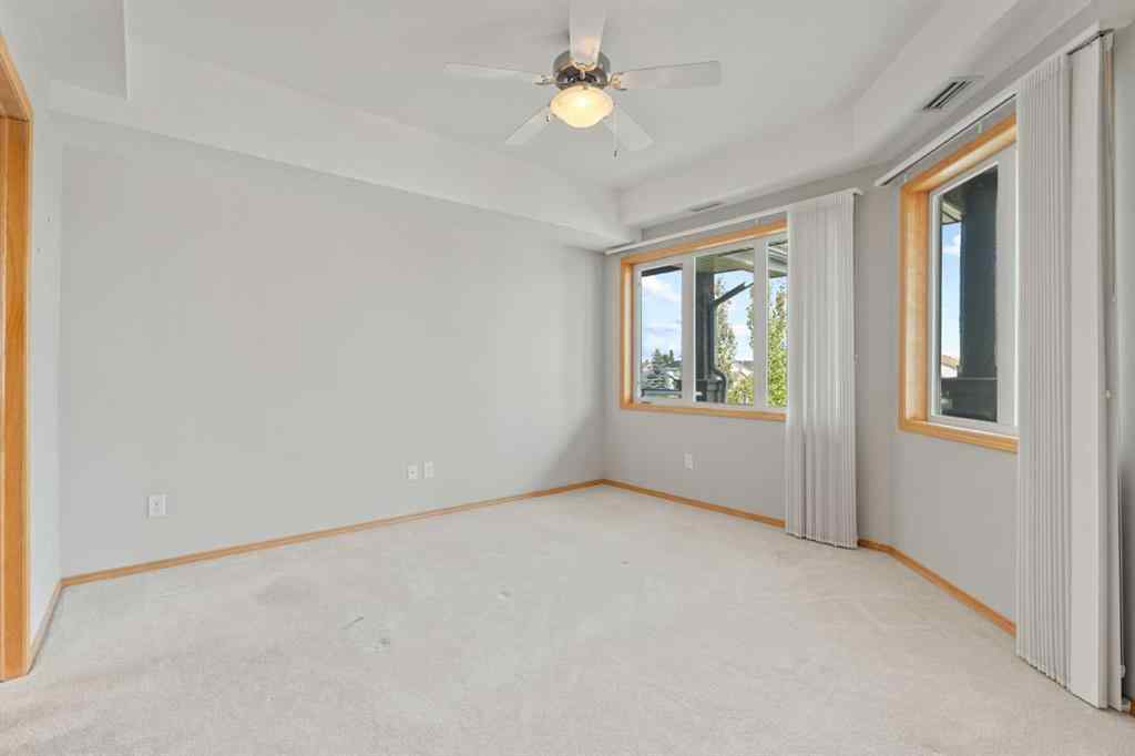 MLS® A2250792 - Unit #207 15 Everstone Drive SW in Evergreen Calgary, Residential