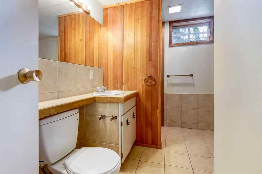 MLS® A2250804 - 7103 Hunterwood Road NW in Huntington Hills Calgary, Residential