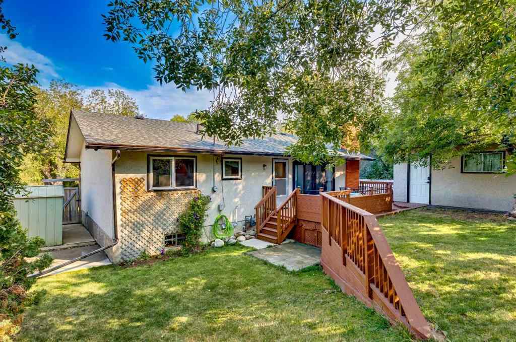 MLS® A2250804 - 7103 Hunterwood Road NW in Huntington Hills Calgary, Residential