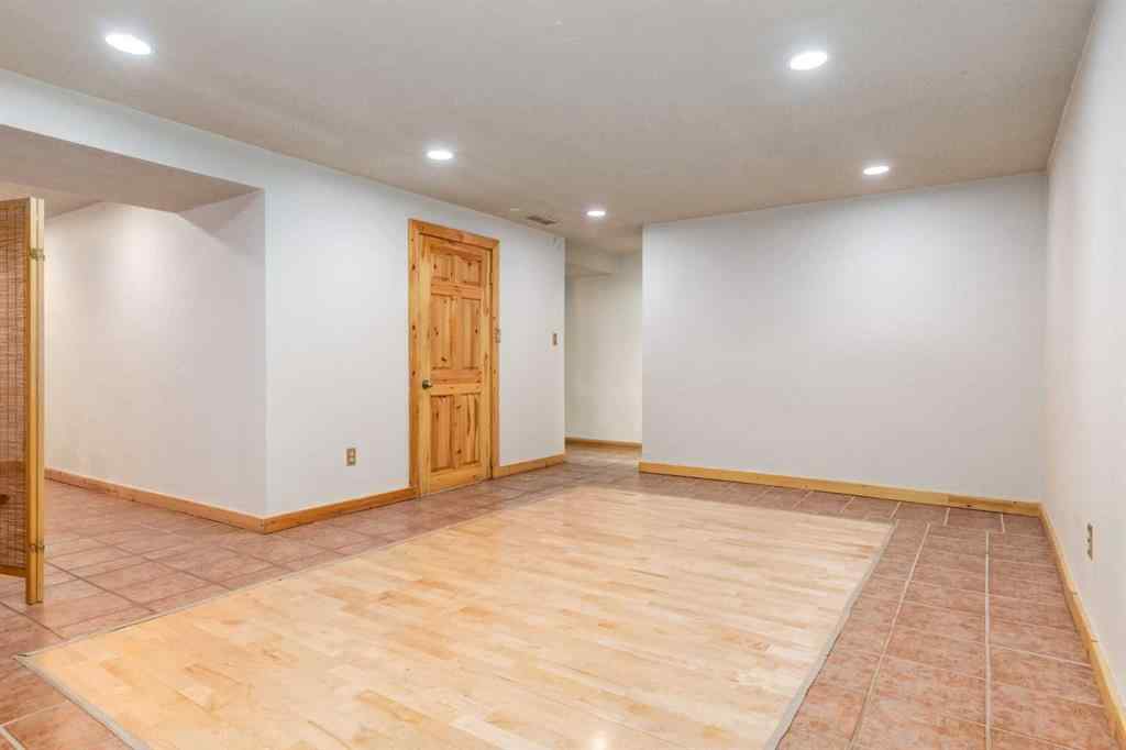 MLS® A2250804 - 7103 Hunterwood Road NW in Huntington Hills Calgary, Residential
