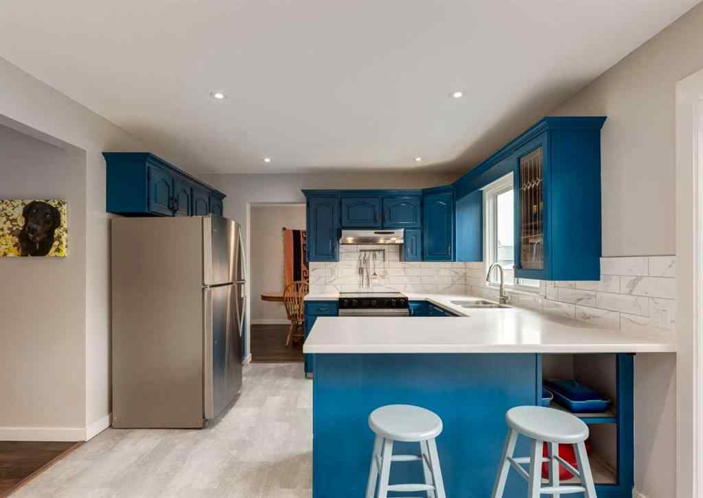 MLS® A2250810 - 127 Silvercreek Close NW in Silver Springs Calgary, Residential
