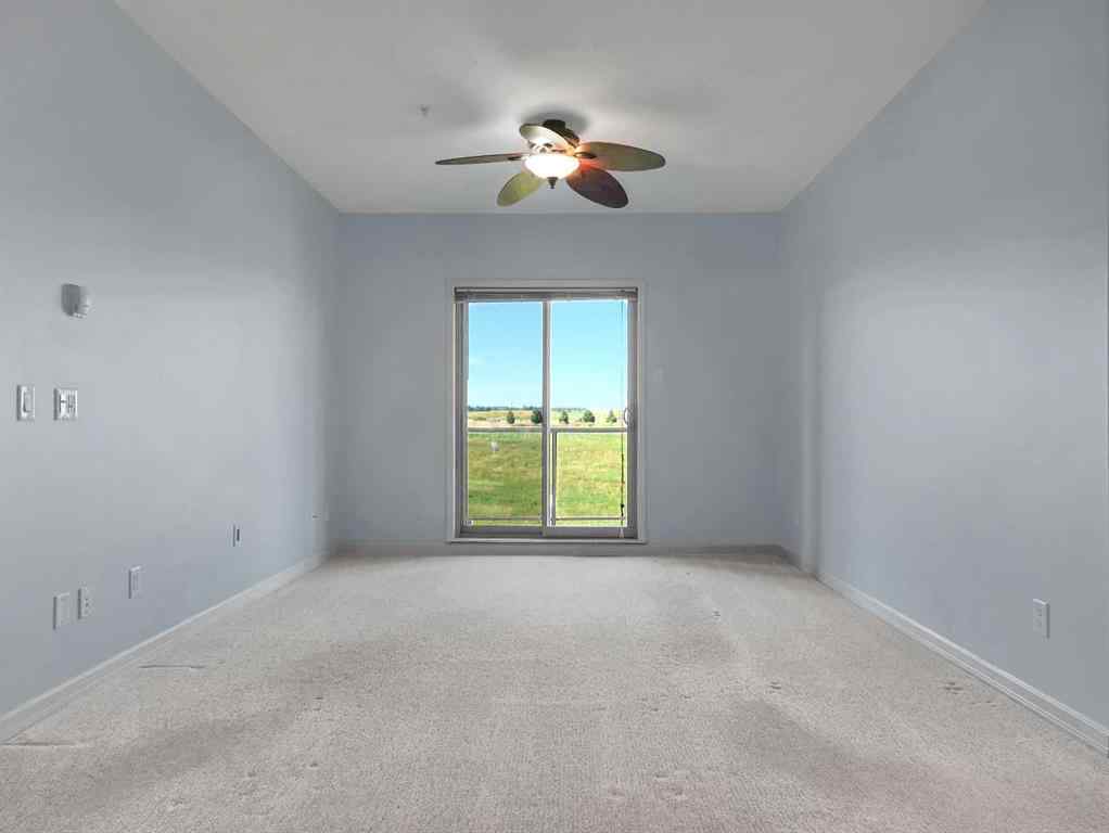 MLS® A2250816 - Unit #4306 92 Crystal Shores Road  in Crystal Shores Okotoks, Residential