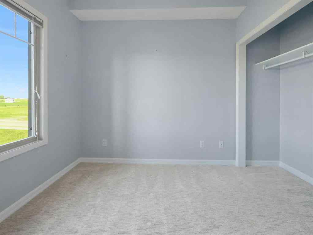 MLS® A2250816 - Unit #4306 92 Crystal Shores Road  in Crystal Shores Okotoks, Residential
