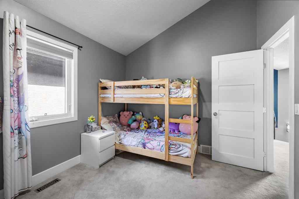 MLS® A2250847 - 2409 7 Avenue NW in West Hillhurst Calgary, Residential