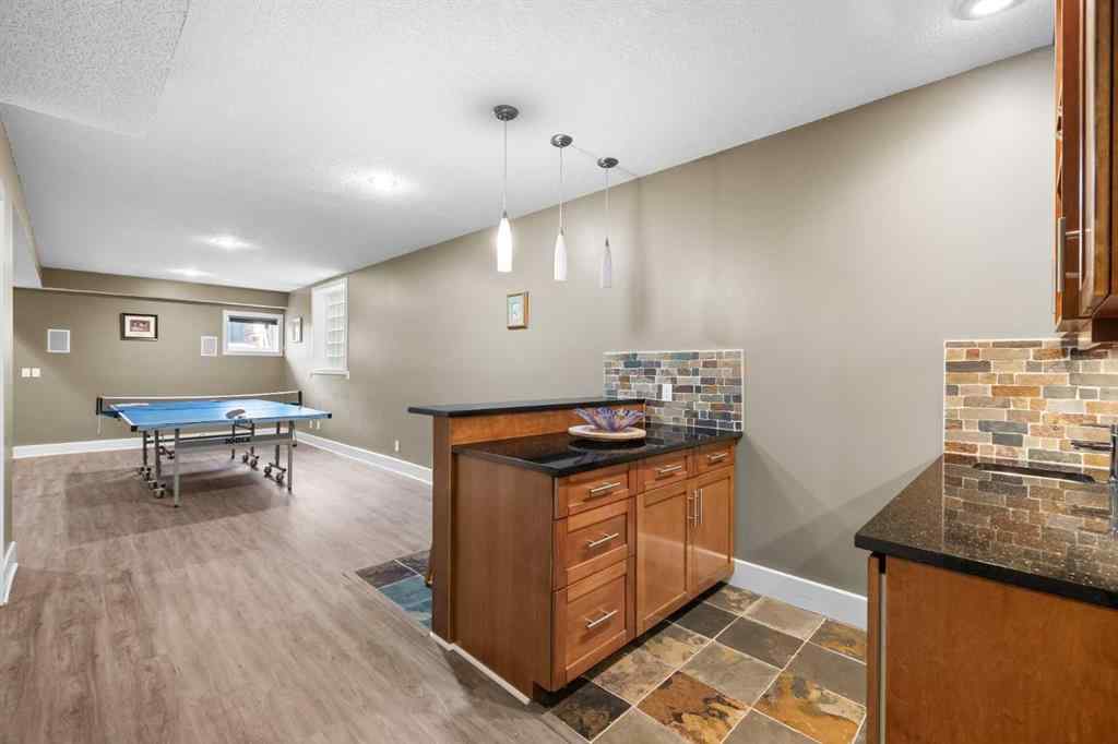 MLS® A2250847 - 2409 7 Avenue NW in West Hillhurst Calgary, Residential